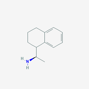 molecular formula C12H17N B1375222 (1R)-1-(1,2,3,4-tetrahydronaphthalen-1-yl)ethan-1-amine CAS No. 851984-50-4