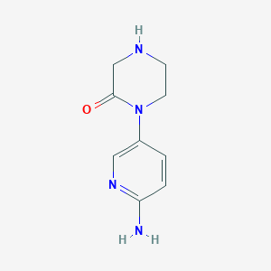 molecular formula C9H12N4O B1375325 1-(6-Aminopyridin-3-yl)piperazin-2-one CAS No. 1378851-84-3