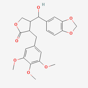 molecular formula C22H24O8 B13754712 4-[1,3-Benzodioxol-5-yl(hydroxy)methyl]-3-[(3,4,5-trimethoxyphenyl)methyl]oxolan-2-one CAS No. 6267-80-7