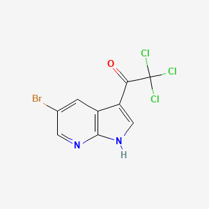 molecular formula C9H4BrCl3N2O B1375539 1-(5-bromo-1H-pyrrolo[2,3-b]pyridin-3-yl)-2,2,2-trichloroethanone CAS No. 1379670-84-4