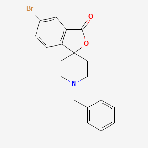 molecular formula C19H18BrNO2 B1375545 1'-benzyl-5-bromo-3H-spiro[isobenzofuran-1,4'-piperidin]-3-one CAS No. 1399183-27-7