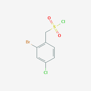 molecular formula C7H5BrCl2O2S B1375721 (2-Bromo-4-chlorophenyl)methanesulfonyl chloride CAS No. 1427379-23-4