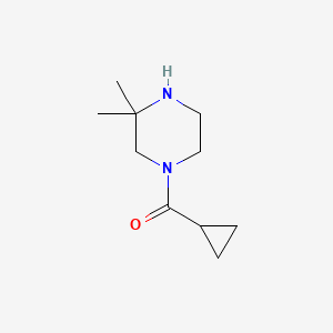 molecular formula C10H18N2O B1375931 1-Cyclopropanecarbonyl-3,3-dimethylpiperazine CAS No. 1268008-16-7