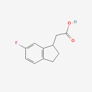 2-(6-Fluoro-2,3-dihydro-1H-inden-1-yl)acetic acid
