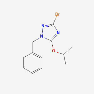 molecular formula C12H14BrN3O B1376048 1-benzyl-3-bromo-5-isopropoxy-1H-1,2,4-triazole CAS No. 1415719-55-9