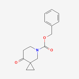 molecular formula C15H17NO3 B1376055 Benzyl 8-oxo-5-azaspiro[2.5]octane-5-carboxylate CAS No. 1232542-21-0
