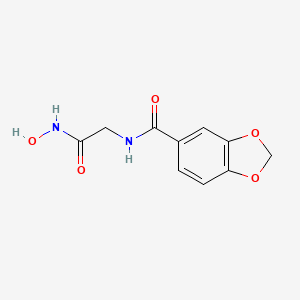 molecular formula C10H10N2O5 B13765692 Acetohydroxamic acid, 2-((1,3-benzodioxol-5-YL)carboxamido)- CAS No. 65654-19-5