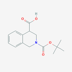 molecular formula C15H19NO4 B1376775 2-[(Tert-butoxy)carbonyl]-1,2,3,4-tetrahydroisoquinoline-4-carboxylic acid CAS No. 936829-00-4