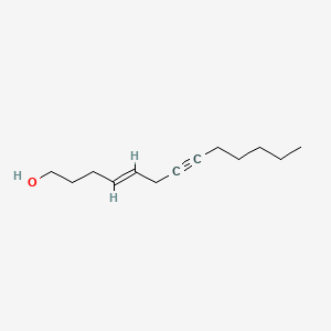 molecular formula C13H22O B13769369 (E)-Tridec-4-en-7-yn-1-ol CAS No. 61565-24-0