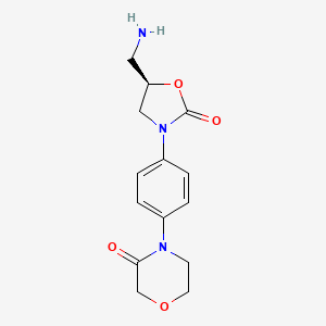 molecular formula C14H17N3O4 B1377228 (R)-4-(4-(5-(Aminomethyl)-2-oxooxazolidin-3-yl)phenyl)morpholin-3-one CAS No. 1411775-06-8