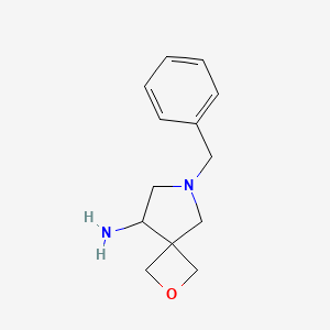 molecular formula C13H18N2O B1377238 6-Benzyl-2-oxa-6-azaspiro[3.4]octan-8-amine CAS No. 219869-44-0
