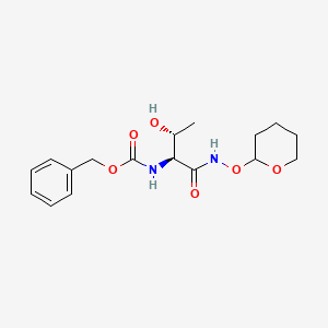 molecular formula C17H24N2O6 B1377551 Benzyl ((2S,3R)-3-hydroxy-1-oxo-1-(((tetrahydro-2H-pyran-2-yl)oxy)amino)butan-2-yl)carbamate CAS No. 1820598-87-5