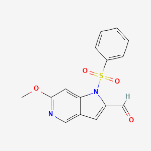 molecular formula C15H12N2O4S B1377573 1-Benzosulphonyl-6-methoxy-5-azaindole-2-carbaldehyde CAS No. 1427502-93-9