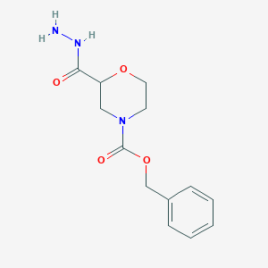 molecular formula C13H17N3O4 B1377607 Benzyl 2-(hydrazinecarbonyl)morpholine-4-carboxylate CAS No. 1384429-09-7