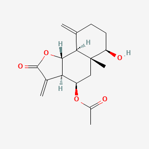 molecular formula C17H22O5 B13777035 Naphtho(1,2-b)furan-2(3H)-one, 4-(acetyloxy)decahydro-6-hydroxy-5a-methyl-3,9-bis(methylene)-, (3aR,4R,5aR,6R,9aS,9bR)- CAS No. 69845-02-9