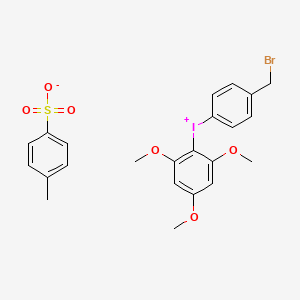 molecular formula C23H24BrIO6S B1377793 [4-(Bromomethyl)phenyl](2,4,6-trimethoxyphenyl)iodonium p-toluenesulfonate CAS No. 1453864-75-9