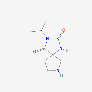 molecular formula C9H15N3O2 B1377813 3-(Propan-2-yl)-1,3,7-triazaspiro[4.4]nonane-2,4-dione CAS No. 1423026-28-1