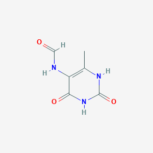 molecular formula C6H7N3O3 B13778629 N-(6-methyl-2,4-dioxo-1H-pyrimidin-5-yl)formamide CAS No. 7357-42-8