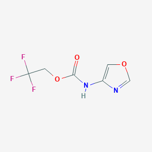 molecular formula C6H5F3N2O3 B1377865 2,2,2-trifluoroethyl N-(1,3-oxazol-4-yl)carbamate CAS No. 1375472-82-4