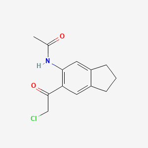 molecular formula C13H14ClNO2 B13778658 Acetamide,n-(6-chloroacetyl-5-indanyl)- 