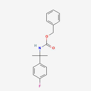 molecular formula C17H18FNO2 B1378028 Benzyl N-[2-(4-fluorophenyl)propan-2-YL]carbamate CAS No. 1403483-60-2