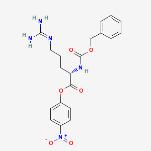 molecular formula C20H23N5O6 B13780682 N(2)-Benzyloxycarbonylarginine-4-nitrophenyl ester CAS No. 68172-31-6