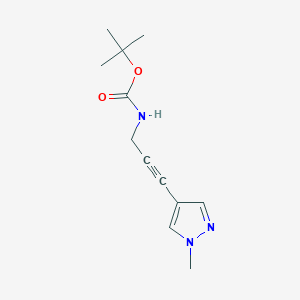 molecular formula C12H17N3O2 B1378129 tert-butyl N-[3-(1-methyl-1H-pyrazol-4-yl)prop-2-yn-1-yl]carbamate CAS No. 1384430-28-7