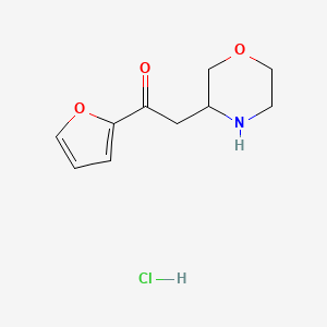 molecular formula C10H14ClNO3 B1378316 1-(Furan-2-yl)-2-(morpholin-3-yl)ethan-1-one hydrochloride CAS No. 1394041-99-6