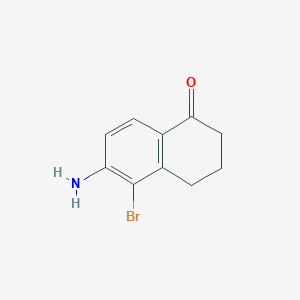 molecular formula C10H10BrNO B1378373 6-amino-5-bromo-3,4-dihydronaphthalen-1(2H)-one CAS No. 884541-34-8