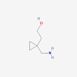molecular formula C6H13NO B1378400 2-[1-(Aminomethyl)cyclopropyl]ethan-1-ol CAS No. 1521554-42-6