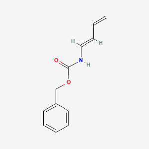molecular formula C12H13NO2 B13785709 benzyl N-[(1E)-buta-1,3-dienyl]carbamate CAS No. 65899-49-2