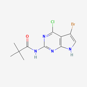 molecular formula C11H12BrClN4O B13786059 N-(5-bromo-4-chloro-7H-pyrrolo[2,3-d]pyrimidin-2-yl)-2,2-dimethylpropanamide 