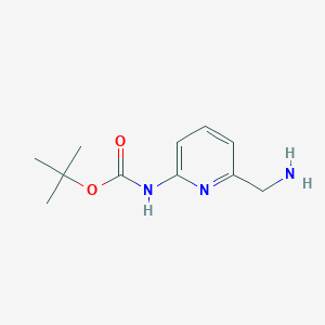 molecular formula C11H17N3O2 B1378988 (6-Aminomethyl-pyridin-2-YL)-carbamic acid tert-butyl ester CAS No. 1060801-10-6
