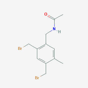 molecular formula C12H15Br2NO B13790714 N-[[2,4-bis(bromomethyl)-5-methyl-phenyl]methyl]acetamide CAS No. 82022-28-4