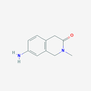 molecular formula C10H12N2O B1379085 7-Amino-2-methyl-1,2-dihydroisoquinolin-3(4H)-one CAS No. 1363337-85-2