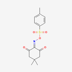 molecular formula C15H17NO5S B13791922 O-Tosyl-5,5-dimethyl-cyclohexane-1,2,3-trione 2-oxime CAS No. 908333-95-9