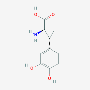 molecular formula C10H11NO4 B13792505 (1S,2R)-1-Amino-2-(3,4-dihydroxyphenyl)cyclopropanecarboxylic acid 