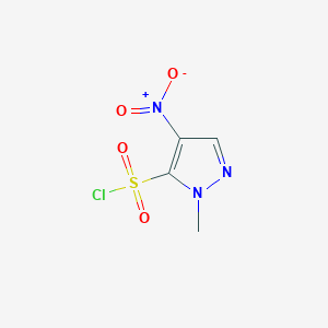 molecular formula C4H4ClN3O4S B1379325 1-methyl-4-nitro-1H-pyrazole-5-sulfonyl chloride CAS No. 1365941-03-2