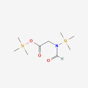 molecular formula C9H21NO3Si2 B13794435 Glycine, N-formyl-N-(trimethylsilyl)-, trimethylsilyl ester 