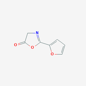 molecular formula C7H5NO3 B13796565 2-(Furan-2-yl)-1,3-oxazol-5(4H)-one CAS No. 76877-10-6