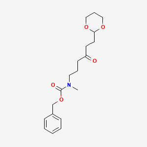 molecular formula C19H27NO5 B13799250 benzyl N-[6-(1,3-dioxan-2-yl)-4-oxohexyl]-N-methylcarbamate 