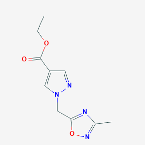 molecular formula C10H12N4O3 B1380039 ethyl 1-[(3-methyl-1,2,4-oxadiazol-5-yl)methyl]-1H-pyrazole-4-carboxylate CAS No. 1461704-82-4