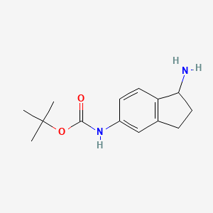molecular formula C14H20N2O2 B1380057 tert-butyl N-(1-amino-2,3-dihydro-1H-inden-5-yl)carbamate CAS No. 1262407-92-0