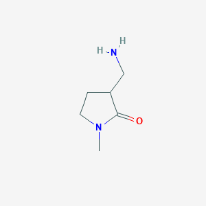 molecular formula C6H12N2O B1380215 3-(Aminomethyl)-1-methylpyrrolidin-2-one CAS No. 1534482-03-5