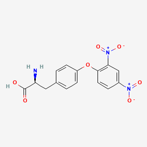 molecular formula C15H13N3O7 B13804670 O-2,4-Dnp-L-Tyrosine 