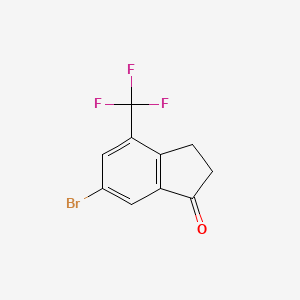 molecular formula C10H6BrF3O B1380568 6-Bromo-4-(trifluoromethyl)-2,3-dihydro-1H-inden-1-one CAS No. 1273655-84-7