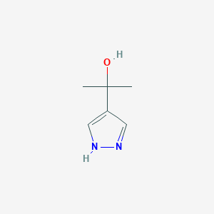 molecular formula C6H10N2O B1380725 2-(1H-Pyrazol-4-yl)propan-2-ol CAS No. 23585-56-0