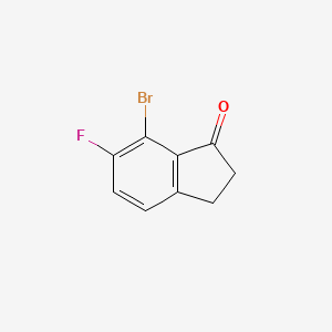 molecular formula C9H6BrFO B1380951 7-Bromo-6-fluoro-1-indanone CAS No. 1260011-83-3