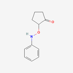 molecular formula C11H13NO2 B13810378 Cyclopentanone, 2-[(phenylamino)oxy]- 