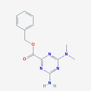 molecular formula C13H15N5O2 B1381221 Benzyl 4-amino-6-(dimethylamino)-1,3,5-triazine-2-carboxylate CAS No. 1803583-03-0